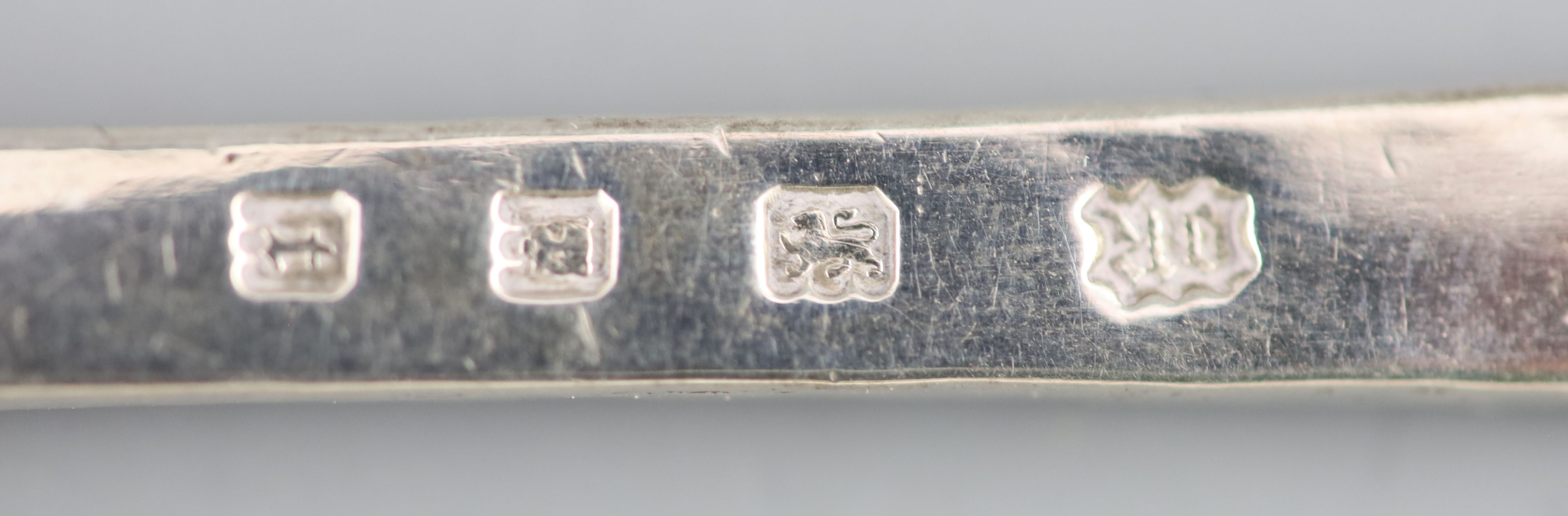 A 1930s Arts & Crafts silver spoon, by Omar Ramsden,